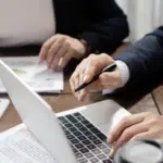 signing contract colleagues tax compliance in AP navigating complexity with intelligent automation