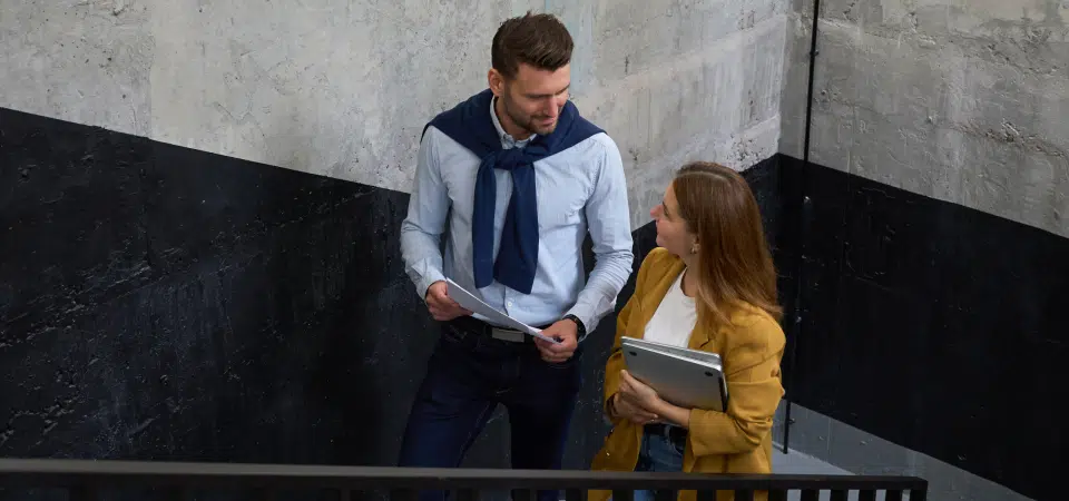 colleagues going up stairs ap tax compliance cevinio ap automation blog